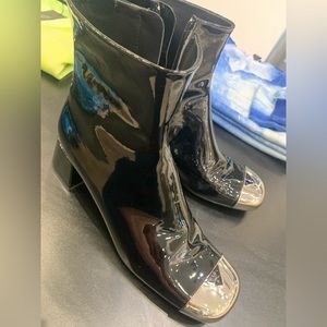 Patent leather Prada booties.